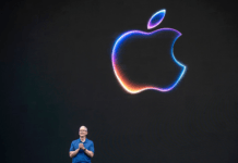 iPhone 18 Pro Launch Timeline: How WWDC 2026 Clues Signal A Mid-September Release A top-down viewpoint of a premium smartphone positioned on a clean white desk next to sleek, minimalist smart devices under soft ambient lighting.